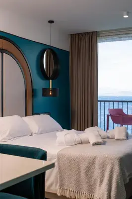 Un ou plusieurs lits dans un hébergement de l'établissement Hotel La Pietra Restaurant & Spa