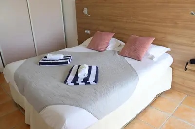 Un ou plusieurs lits dans un hébergement de l'établissement Hotel Bellevue