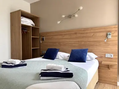 Un ou plusieurs lits dans un hébergement de l'établissement Hotel Bellevue