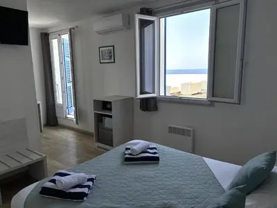 Un ou plusieurs lits dans un hébergement de l'établissement Hotel Bellevue