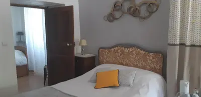 Un ou plusieurs lits dans un hébergement de l'établissement Casa san salvadore