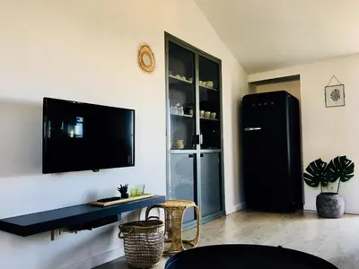 Télévision ou salle de divertissement dans l'établissement Appartement Casalea - Casadibastia - Bastia centre