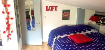 Un ou plusieurs lits dans un hébergement de l'établissement Maison du bonheur