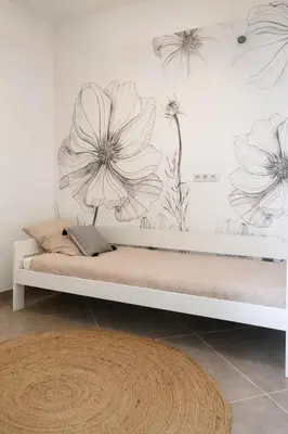 Un ou plusieurs lits dans un hébergement de l'établissement Pianotolu - Rez de villa entre mer et montagne
