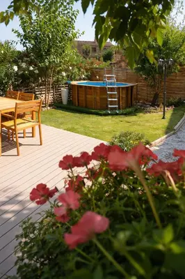 Jardin de l'établissement Pianotolu - Rez de villa entre mer et montagne