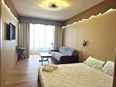 Un ou plusieurs lits dans un hébergement de l'établissement Hôtel le Colibri