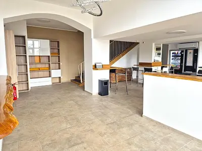 Cuisine ou kitchenette dans l'établissement Hôtel le Colibri