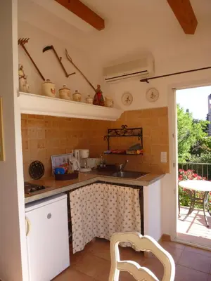 Cuisine ou kitchenette dans l'établissement Résidence A Merula