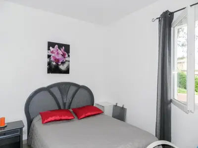 Un ou plusieurs lits dans un hébergement de l'établissement Holiday Home Cavoni by Interhome