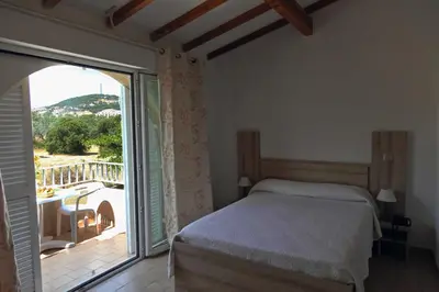 Un ou plusieurs lits dans un hébergement de l'établissement Motel le Vieux Moulin