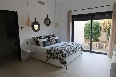 Un ou plusieurs lits dans un hébergement de l'établissement Villa Paradisu
