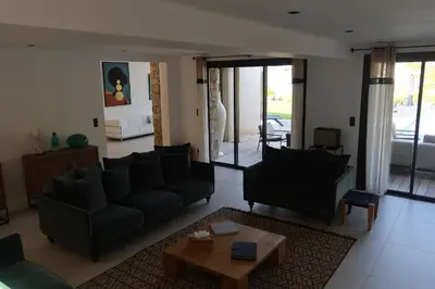 Coin salon dans l'établissement Villa Paradisu