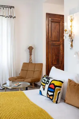 Coin salon dans l'établissement Hôtel La Dimora & Spa