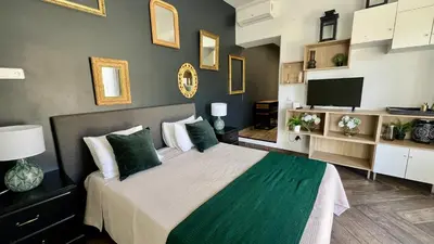 Télévision ou salle de divertissement dans l'établissement Appartement chic proche de la mer