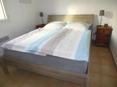 Un ou plusieurs lits dans un hébergement de l'établissement Villa mit grosser Sommerküche und Pool, 8 Minuten zum Sandstrand Cap Sud