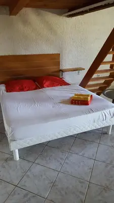 Un ou plusieurs lits dans un hébergement de l'établissement English Club in Corsica A