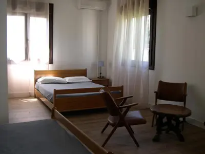 Un ou plusieurs lits dans un hébergement de l'établissement Hotel Costa Verde