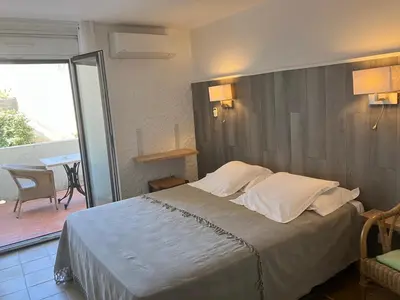Un ou plusieurs lits dans un hébergement de l'établissement Hotel Costa Verde