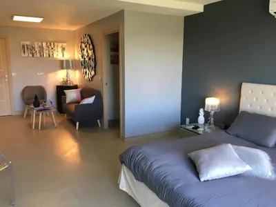 Coin salon dans l'établissement Chambre Élégante Lisa
