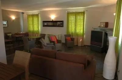 Coin salon dans l'établissement Hôtel la Palma