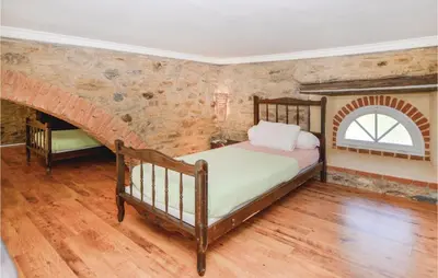Un ou plusieurs lits dans un hébergement de l'établissement Amazing Home In Santa Maria Poggio