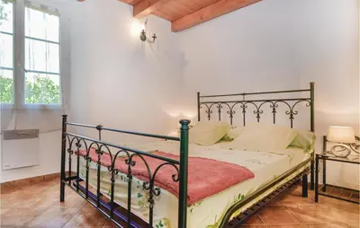 Un ou plusieurs lits dans un hébergement de l'établissement Amazing Home In Santa Maria Poggio