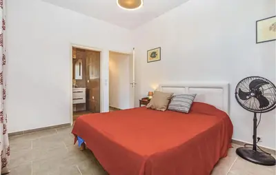 Un ou plusieurs lits dans un hébergement de l'établissement Amazing Home In St Florent With Wifi