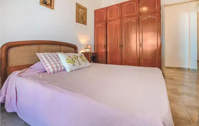 Un ou plusieurs lits dans un hébergement de l'établissement Amazing Home In St Florent With Wifi