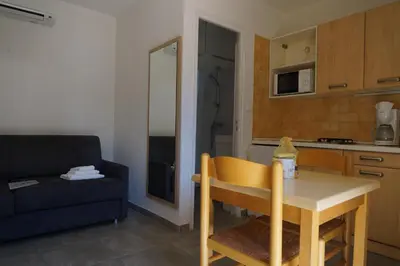 Cuisine ou kitchenette dans l'établissement Résidence Les Castors