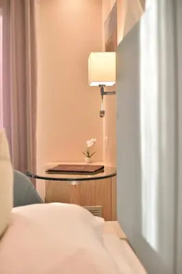 Un ou plusieurs lits dans un hébergement de l'établissement Hotel Tettola