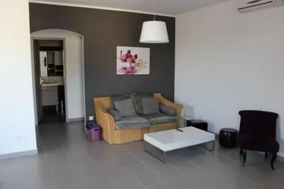 Coin salon dans l'établissement Les Orangers