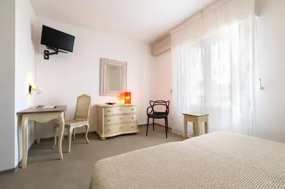 Un ou plusieurs lits dans un hébergement de l'établissement Hotel Cala di l'Oru
