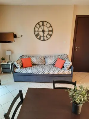 Coin salon dans l'établissement Chez Valérie et Stéphane, Les terrasses de Lozari