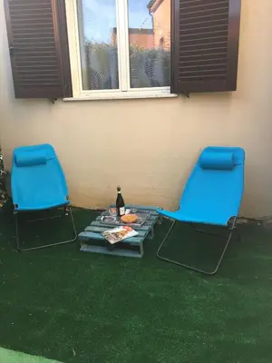 Coin salon dans l'établissement Chez Valérie et Stéphane, Les terrasses de Lozari