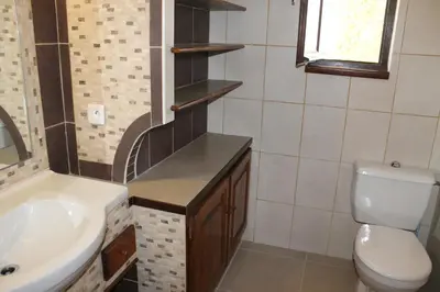 Salle de bains dans l'établissement Domaine Le Clos des Oliviers