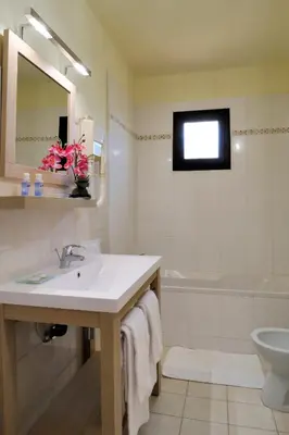 Salle de bains dans l'établissement Résidence Stella Marina