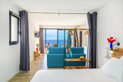 Coin salon dans l'établissement Les Terrasses d'Erbalunga
