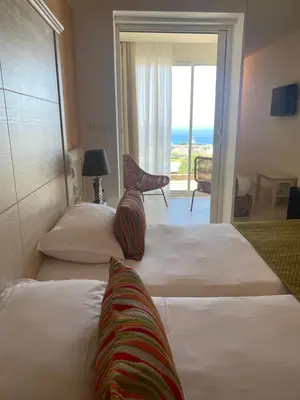 Un ou plusieurs lits dans un hébergement de l'établissement Hôtel Funtana Marina