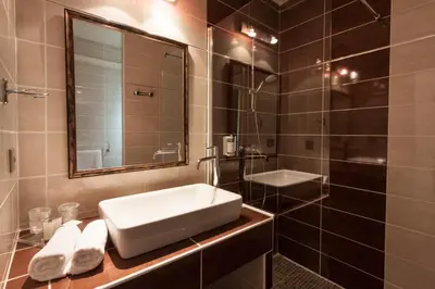 Salle de bains dans l'établissement Hôtel Funtana Marina