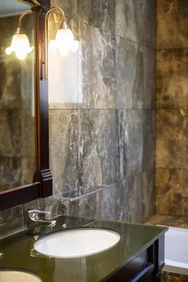 Salle de bains dans l'établissement Hôtel Les Voyageurs