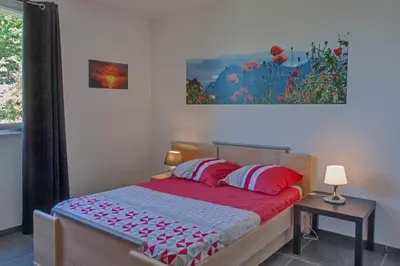 Un ou plusieurs lits dans un hébergement de l'établissement Villa 