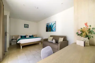 Un ou plusieurs lits dans un hébergement de l'établissement Hotel & Restaurant San Pellegrino