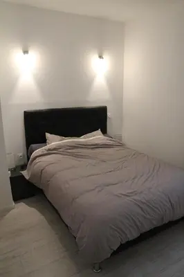 Un ou plusieurs lits dans un hébergement de l'établissement Appartement Sampiero
