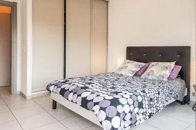 Un ou plusieurs lits dans un hébergement de l'établissement Casa Pouty Beach