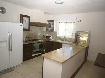 Cuisine ou kitchenette dans l'établissement Villa in Moriani-Plage with Sea View