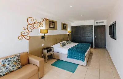 Un ou plusieurs lits dans un hébergement de l'établissement Hôtel Liberata & Spa