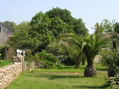 Jardin de l'établissement Holiday Home Moriani-Plage with Pool