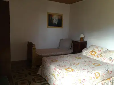 Un ou plusieurs lits dans un hébergement de l'établissement Maison de charme Corse sauvage