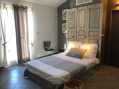 Un ou plusieurs lits dans un hébergement de l'établissement Villa vue mer