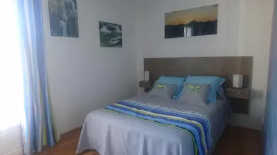 Un ou plusieurs lits dans un hébergement de l'établissement Joli villa Marcel classée 3 étoiles